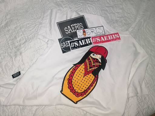 Customer photo review of Matryoshka Damen Oversized T-Shirt weiß by SAEBIS®