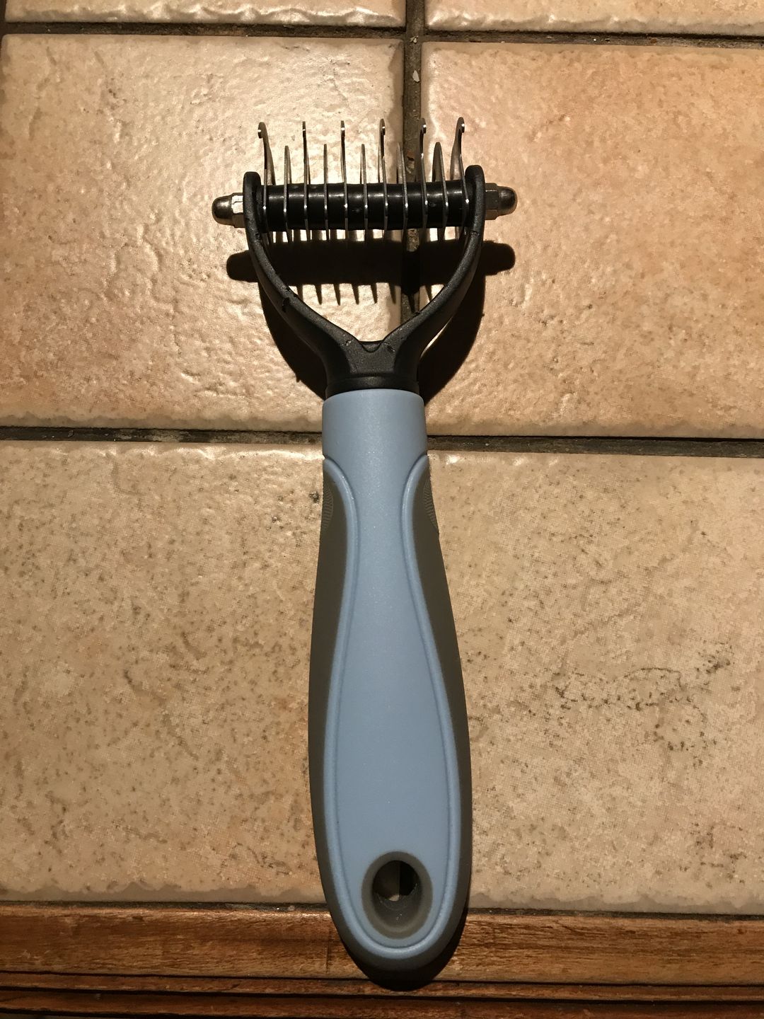 Customer photo review of Peigne de Toilettage Professionnel PuppySafe™