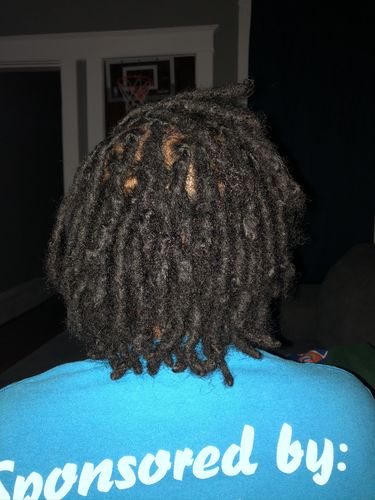 Customer photo review of Nourishing & Conditioning Hair Oil | 4 oz