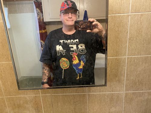 Customer photo review of Chicken Lollipop Unisex Tee