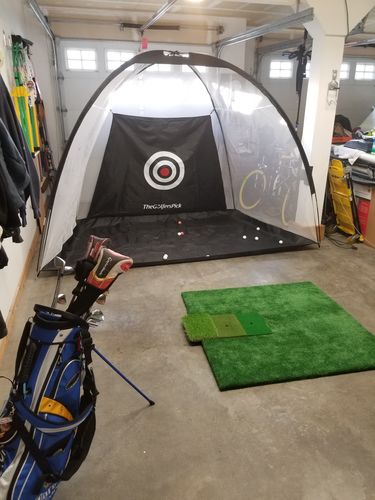 Customer photo review of Golf Practice Driving Net for Indoors and Outdoors | Tri-Turf Hitting Mat