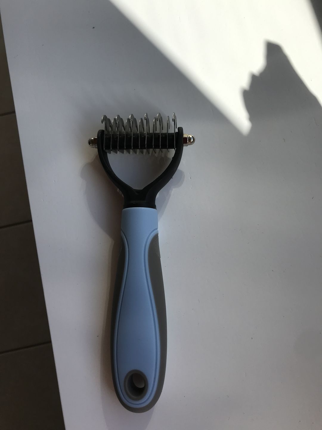 Customer photo review of Peigne de Toilettage Professionnel PuppySafe™