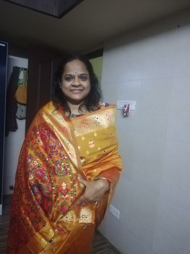 Customer photo review of Classic Orange And Pink Woven Rangkat Banarasi Saree