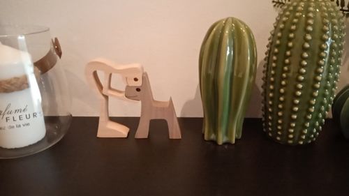 Customer photo review of Unconditional Love Wood Figurine