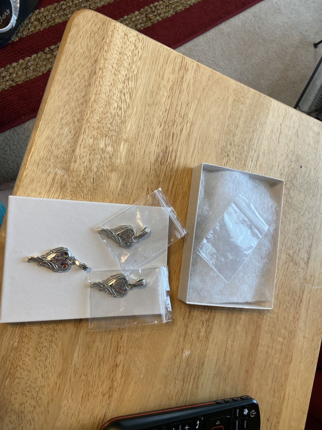 Customer photo review of Angel Wing Heart Pendant  - Engravable