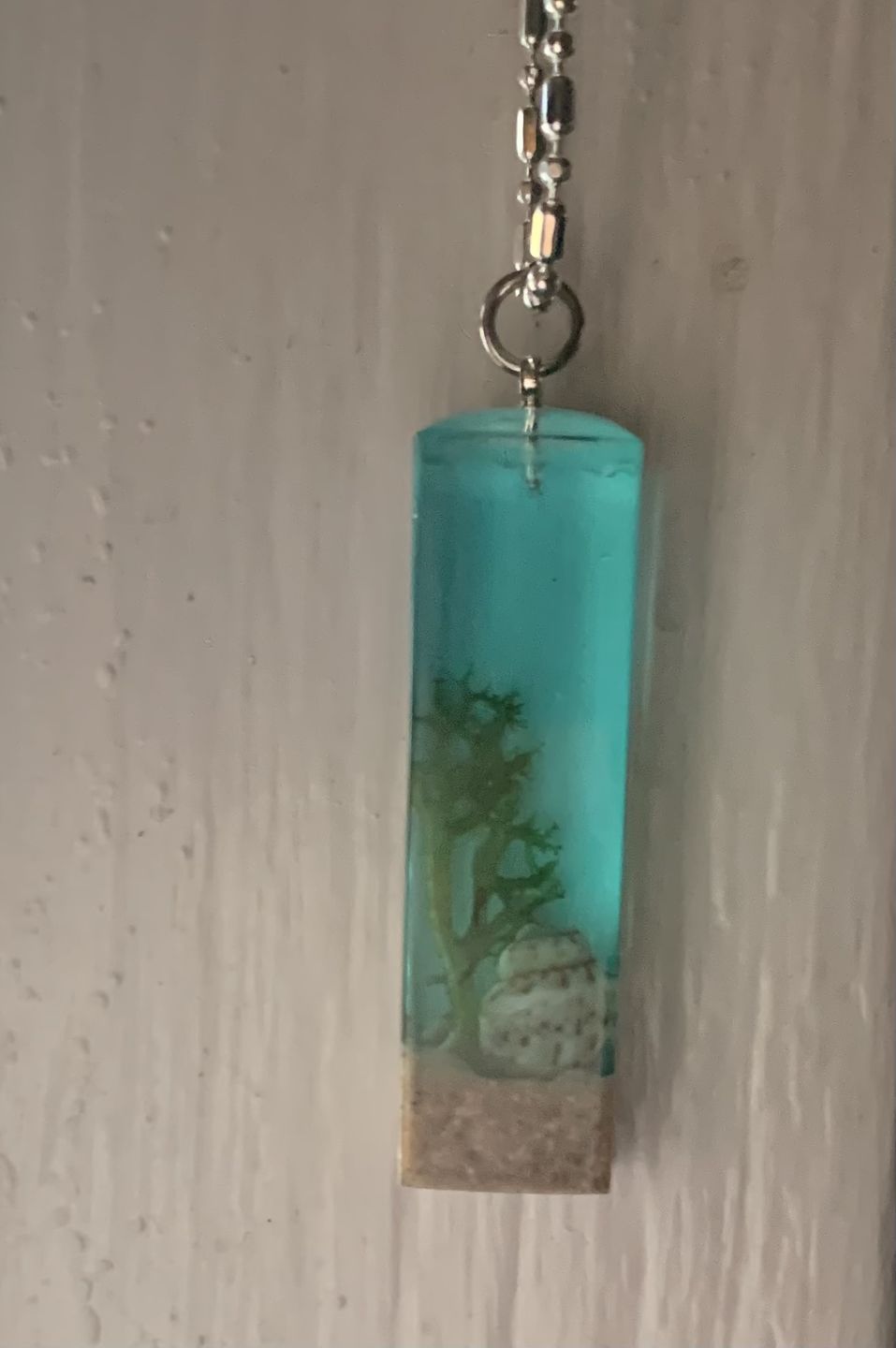 Customer photo review of Deep in the Ocean Pendant with Seaweed and Seashell