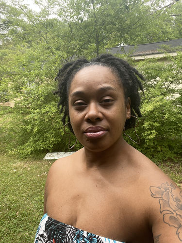 Customer photo review of Africa Steel Earrings