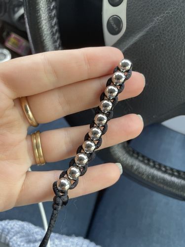 Customer photo review of Kaiko Caterpillar Unisex Necklace