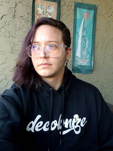 Customer photo review of Decolonize Hoodie