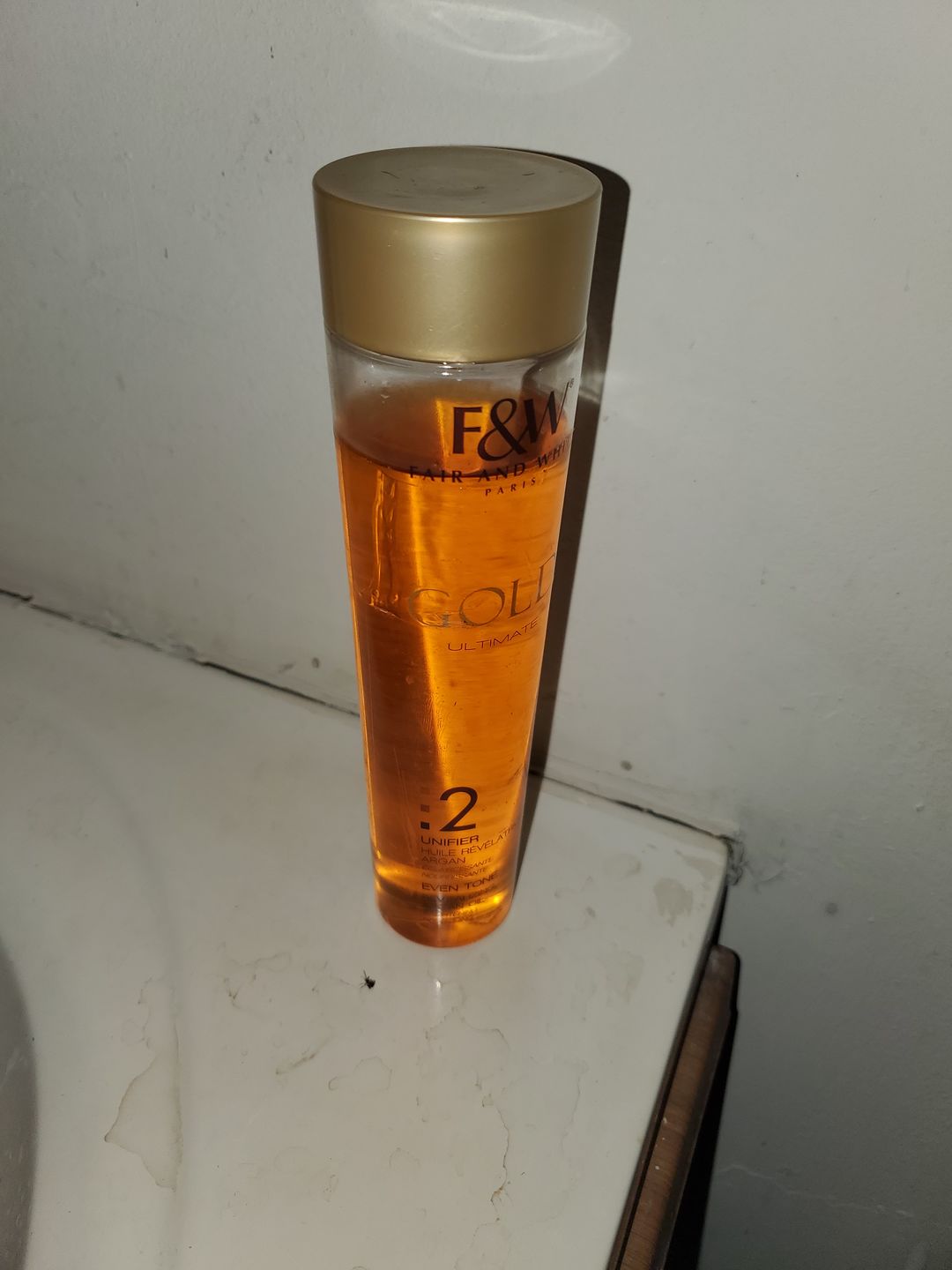 Customer photo review of Fair & White Gold Revitalizing Argan Oil - Nourishes Skin - 200ml / 6.76 fl oz