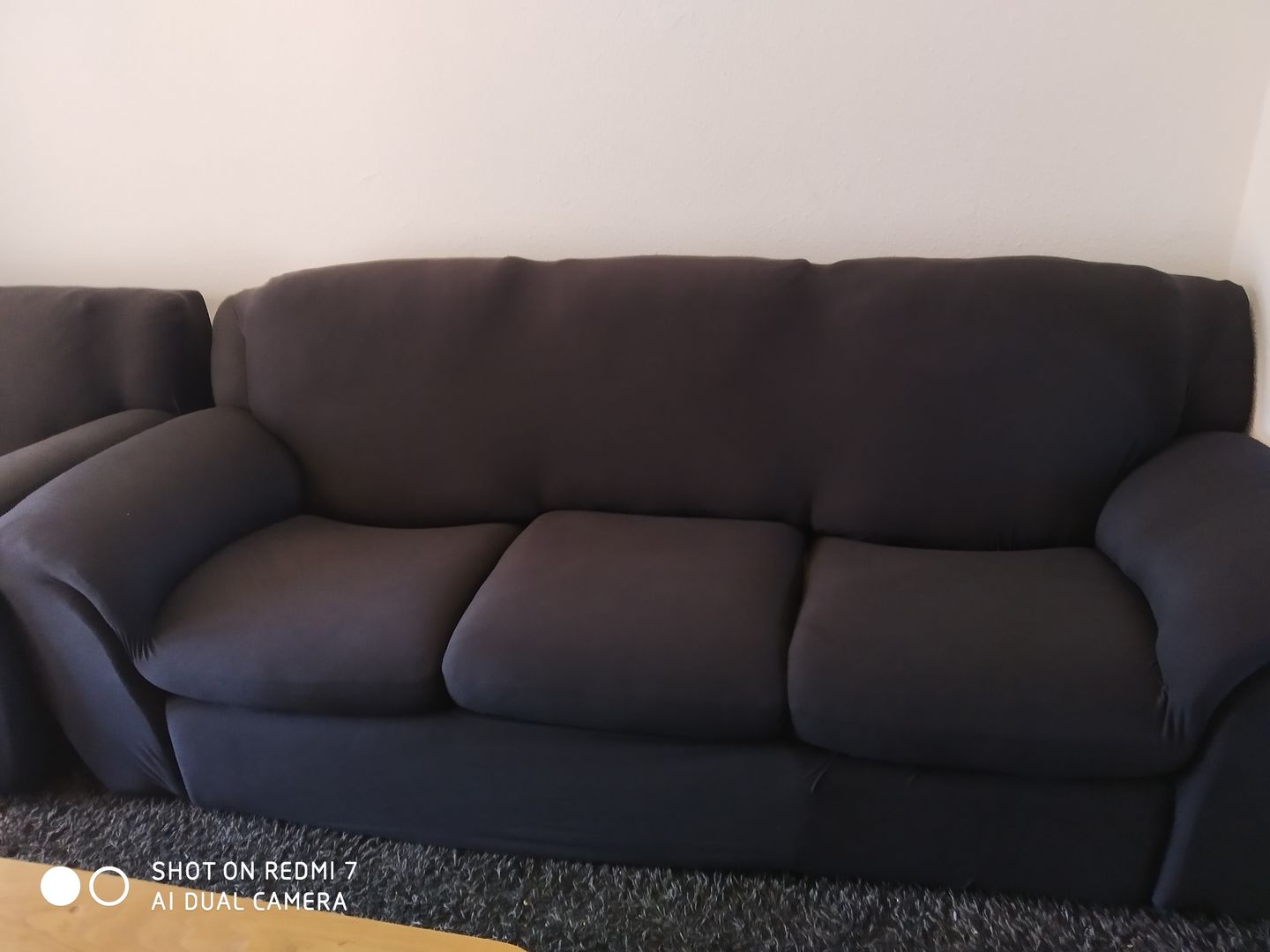 Customer photo review of Noir - Housses Extensibles de Fauteuil et Canapé - La Maison des Housses