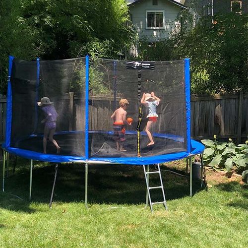 Customer photo review of Kangaroo Hoppers 15 FT Round Kids Trampoline with Safety Enclosure Net, Basketball Hoop and Ladder, Outdoor Fun Summer Trampoline