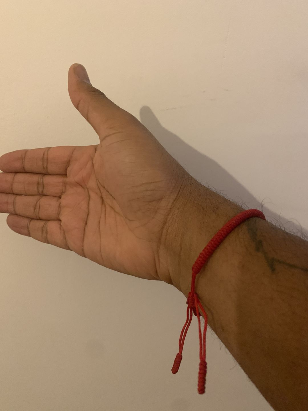 Customer photo review of Tibetan Buddhist Handmade Lucky Knots Bracelet