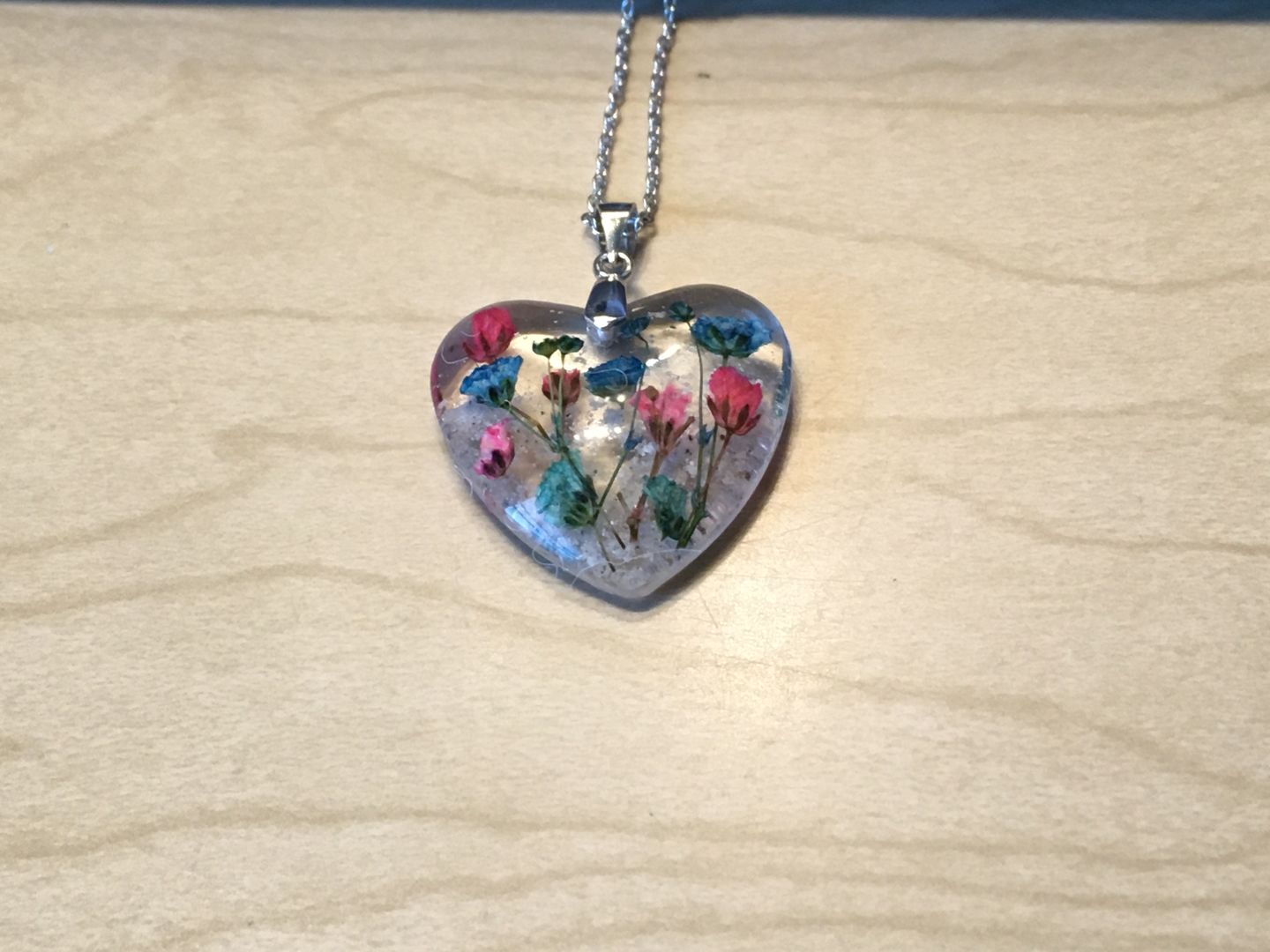Customer photo review of Flower Heart Necklace with Real Flower and Cremains