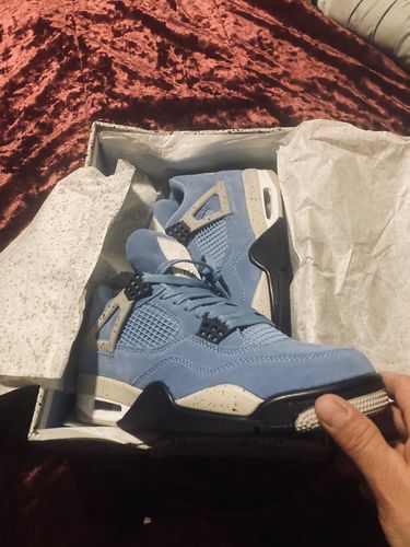 Customer photo review of Air Jordan 4 Retro 'University Blue'