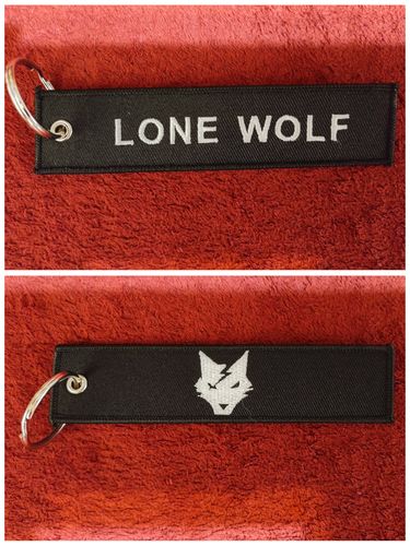 Customer photo review of Remove Before Flight Key Chain