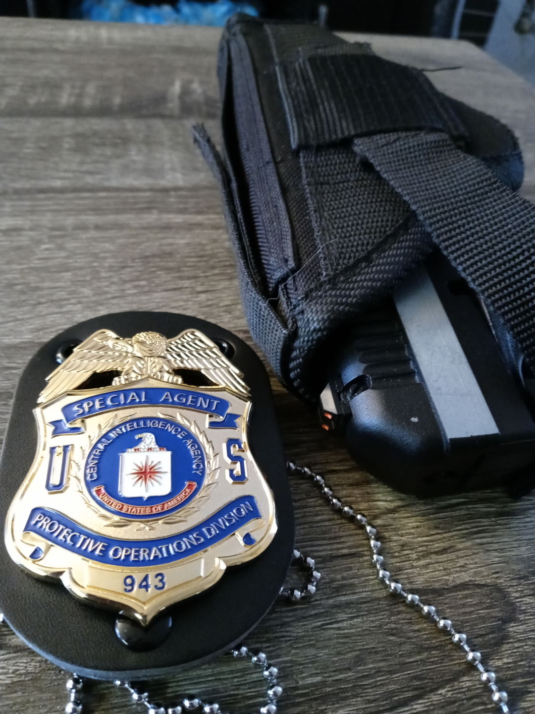Customer photo review of CIA Protective Operations Division Special Agent Badge Solid Copper Replica Movie Props #943