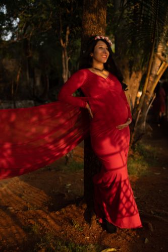 Customer photo review of Exclusive Cherry Red Trail Maternity Photoshoot Gown