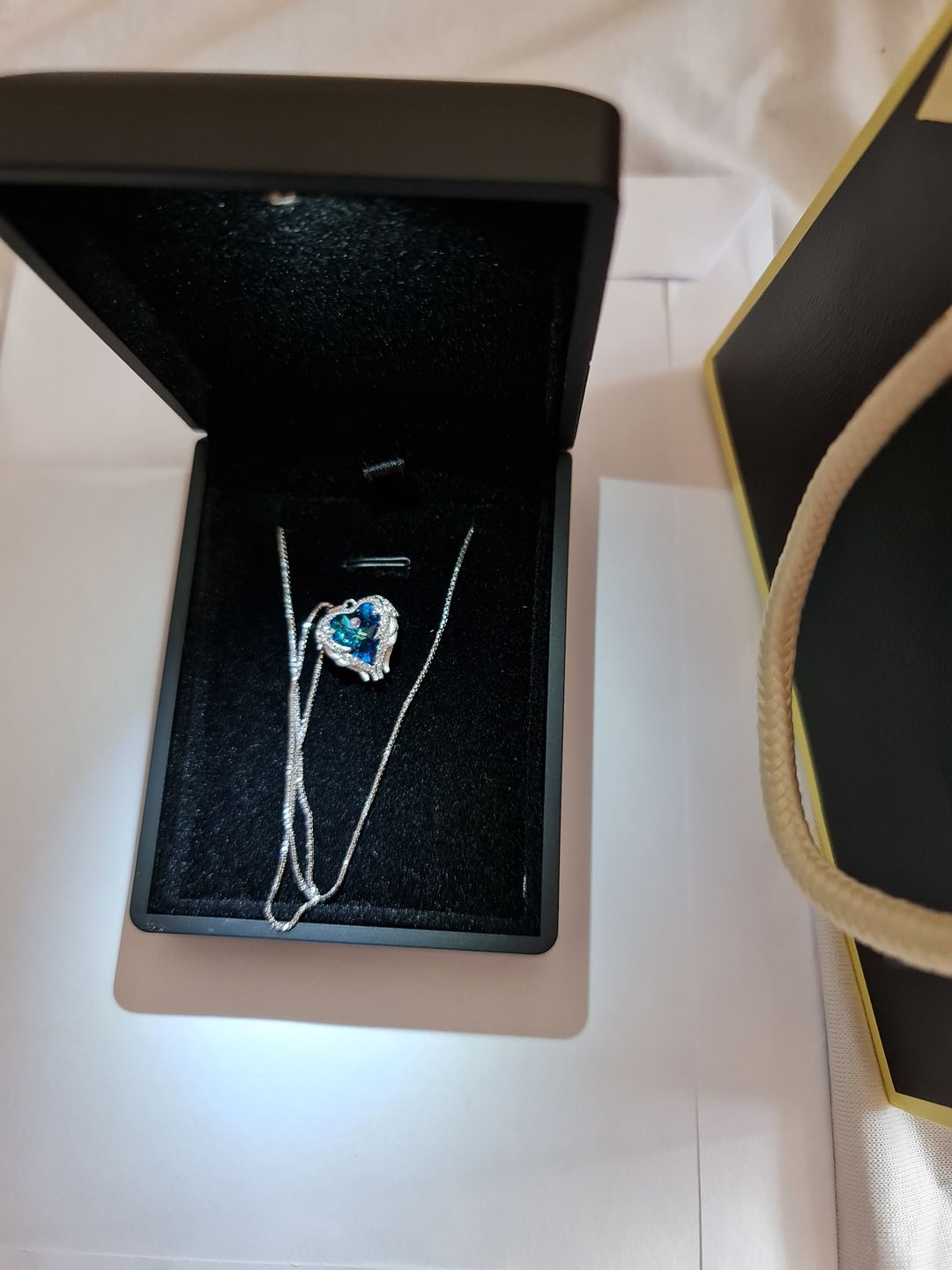 Customer photo review of Guardian Angel Wings Necklace