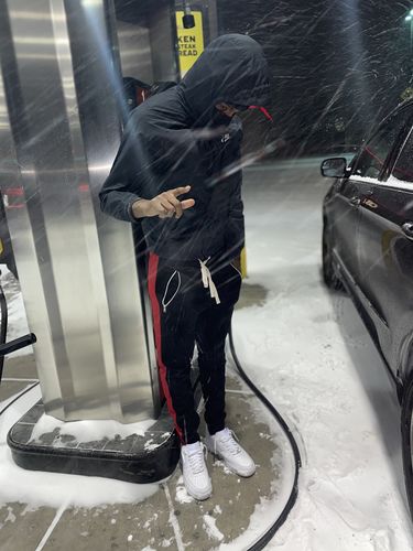 Customer photo review of Premium Side Stripe Zip Pocket Track Pants (Black - Red)