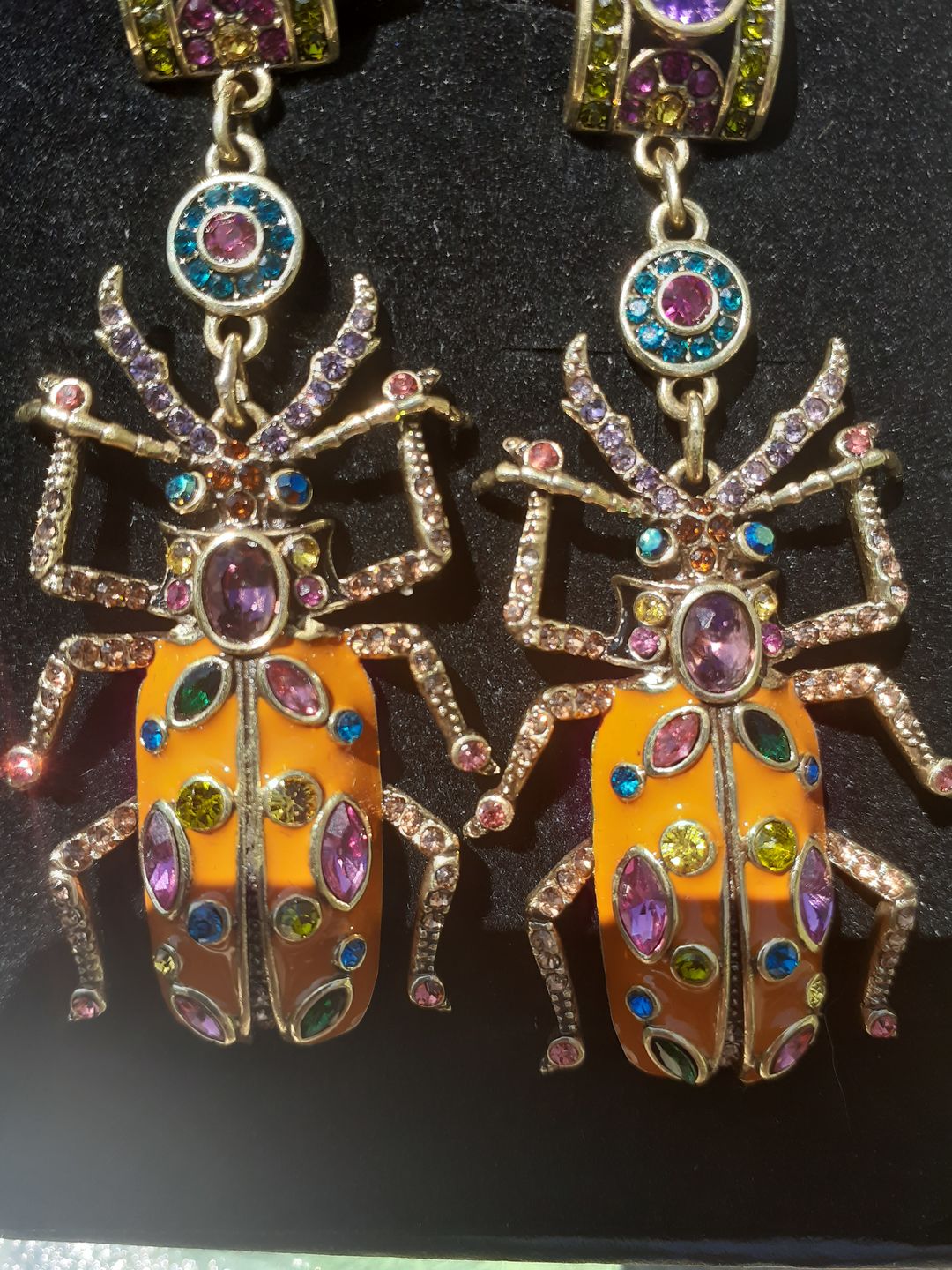 Customer photo review of HEIDI DAUS®"Big Critter" Enamel Crystal Critter Drop Earrings