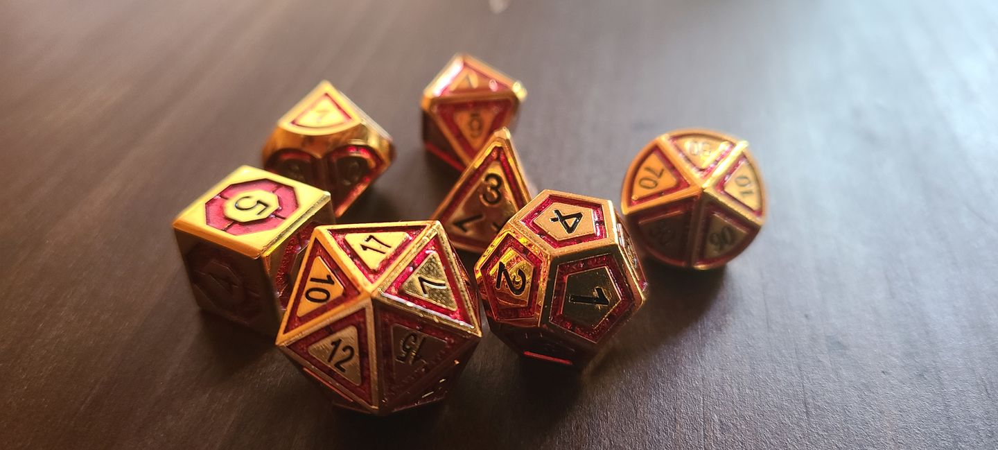 Customer photo review of CLERIC'S DOMAIN RED & GOLD METAL DICE