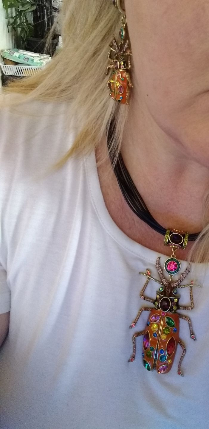 Customer photo review of HEIDI DAUS®"Big Critter" Enamel Crystal Leather Critter Necklace