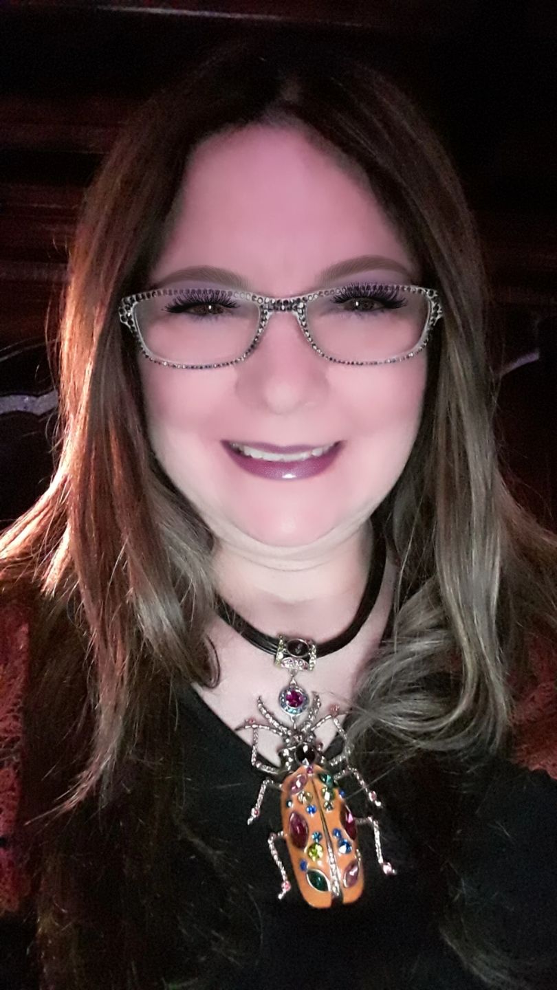 Customer photo review of HEIDI DAUS®"Big Critter" Enamel Crystal Leather Critter Necklace