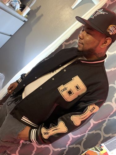 Customer photo review of "Blessed" Varsity Jacket