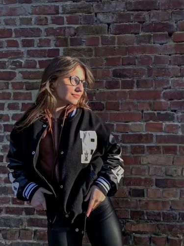 Customer photo review of "Blessed" Varsity Jacket