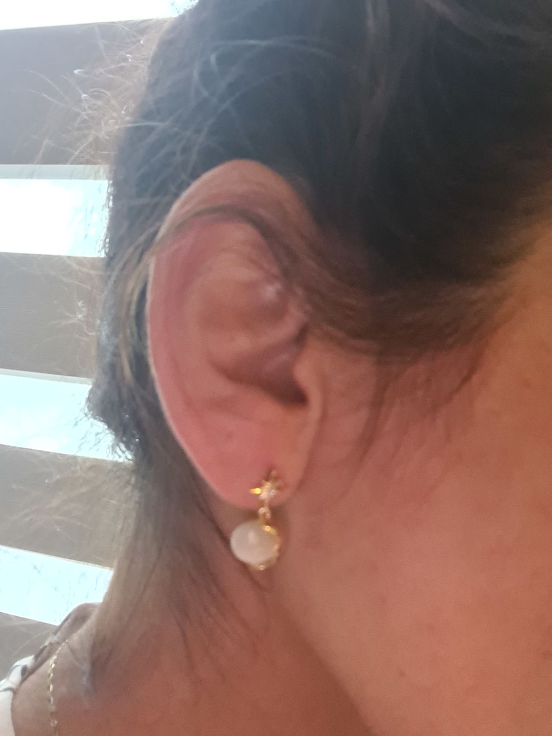 Customer photo review of Aretes de Saturno de Ópalo