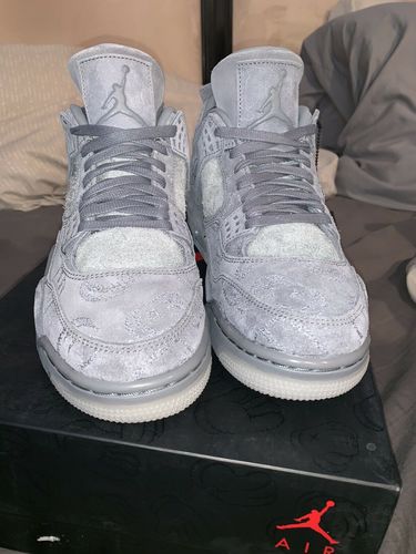 Jordan 4 Retro Kaws – UnicGo