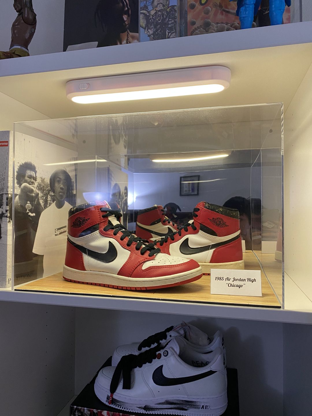 Customer photo review of Acrylic Large Shoe Display Case for Basketball Shoe Soccer Cleat Football Cleat - 15" x 8" x 9" Mirror