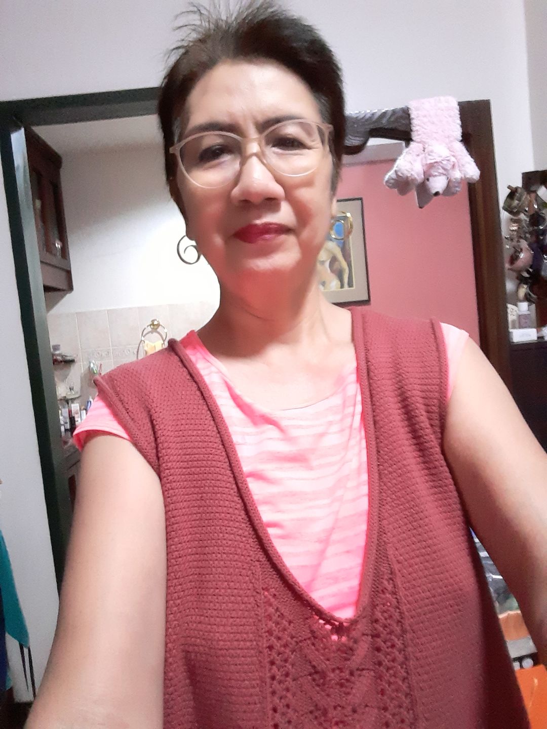 Customer photo review of Plus Size Women Pocket Knitted Hollow Sweater Vest
