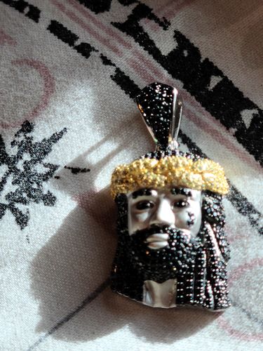 Customer photo review of Mini Masterpiece Black and Yellow Silver Jesus