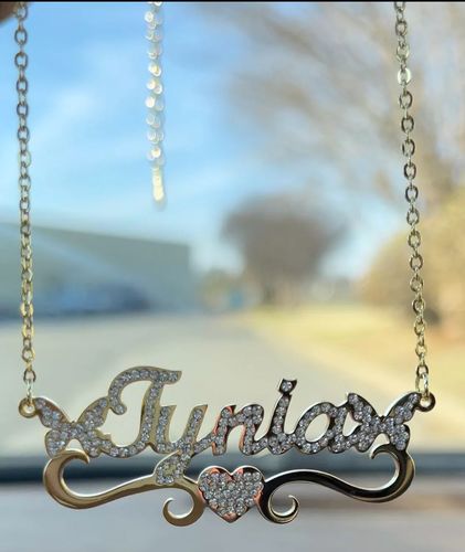 Customer photo review of Iced Out Butterfly Pendants