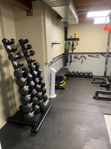 Customer photo review of 5-50lb Dumbbell set with high quality stand- shipping included