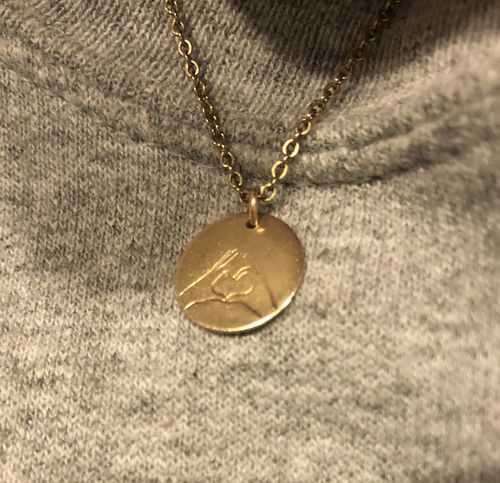 Customer photo review of Mia Hand Gesture Necklace