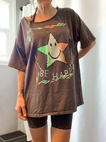 Customer photo review of Be Happy Tee