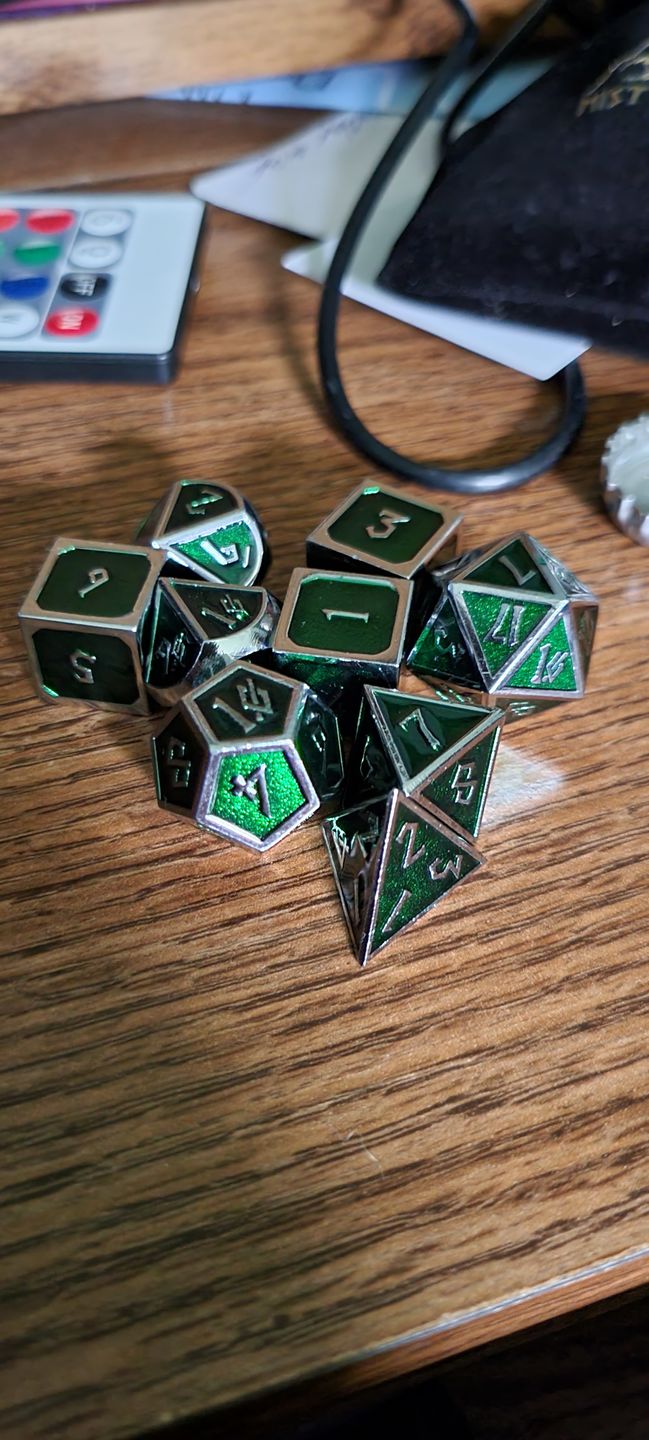 Customer photo review of ELDER RUNES EMERALD AND SILVER METAL SET