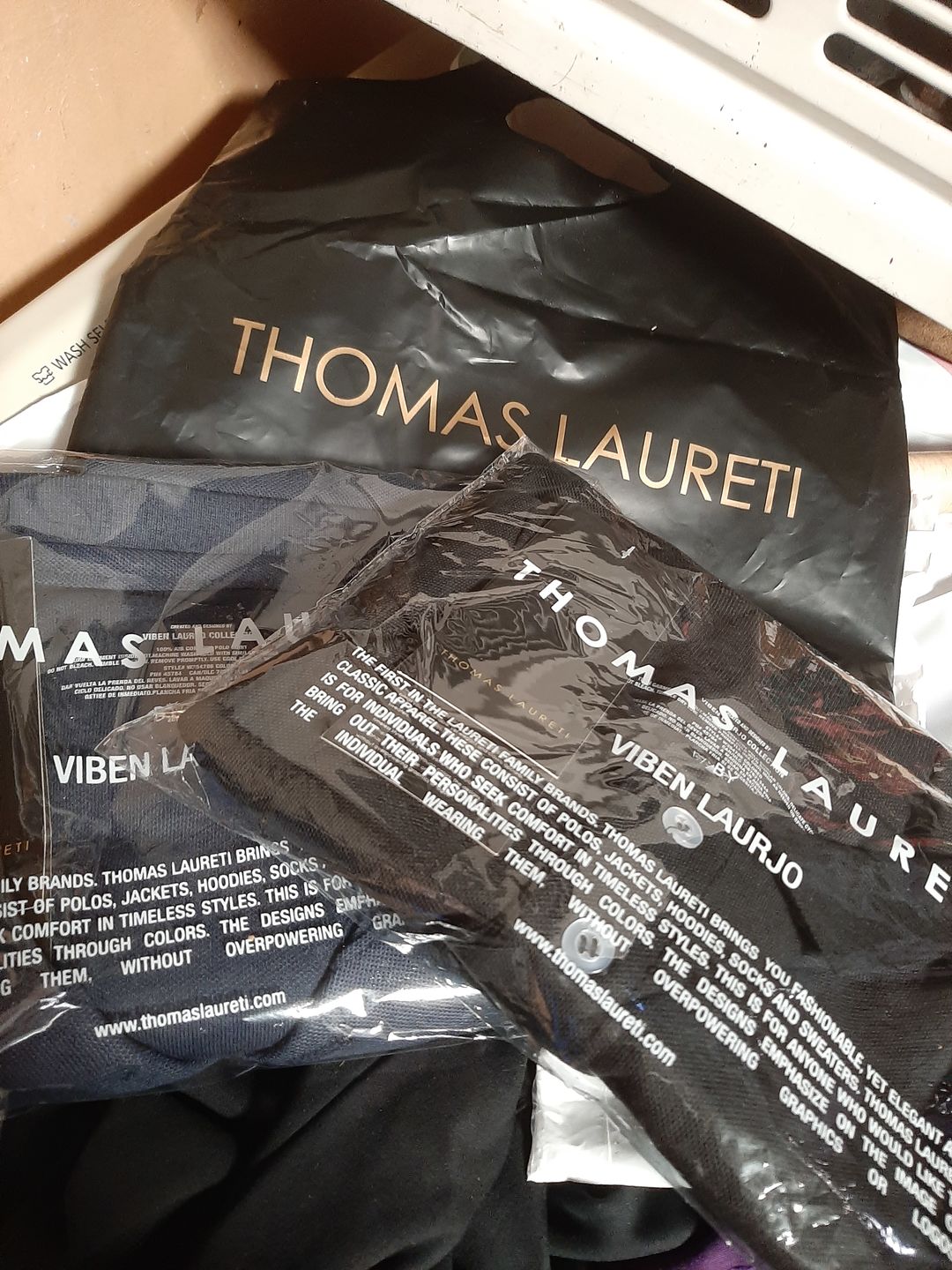 Customer photo review of Men's Thomas Laureti Black Polo Shirt