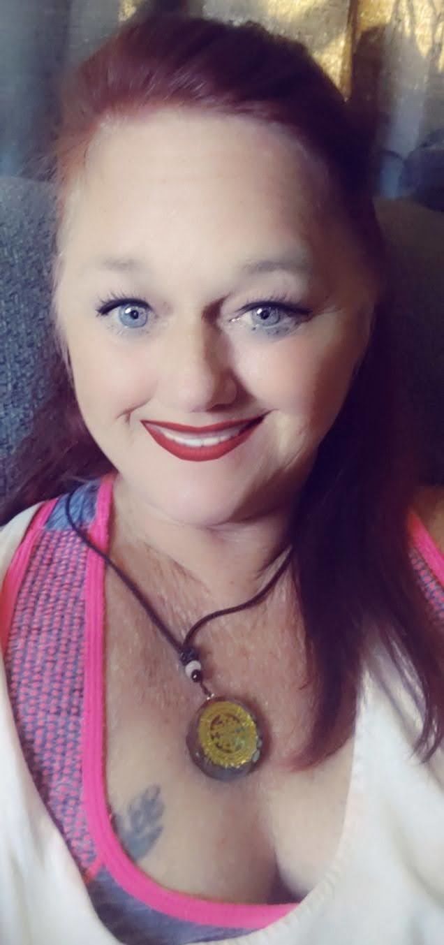 Customer photo review of Sacred Sri Yantra Orgonite Chakra Necklace