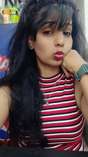 Customer photo review of Silver Coiled Hoop Nose Ring