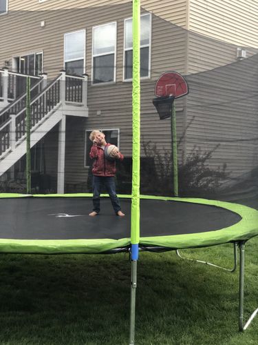 Customer photo review of Kangaroo Hoppers 15 FT Round Kids Trampoline with Safety Enclosure Net, Basketball Hoop and Ladder, Outdoor Fun Summer Trampoline