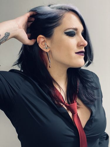 Customer photo review of Blood Sworn Dagger Stud Earrings