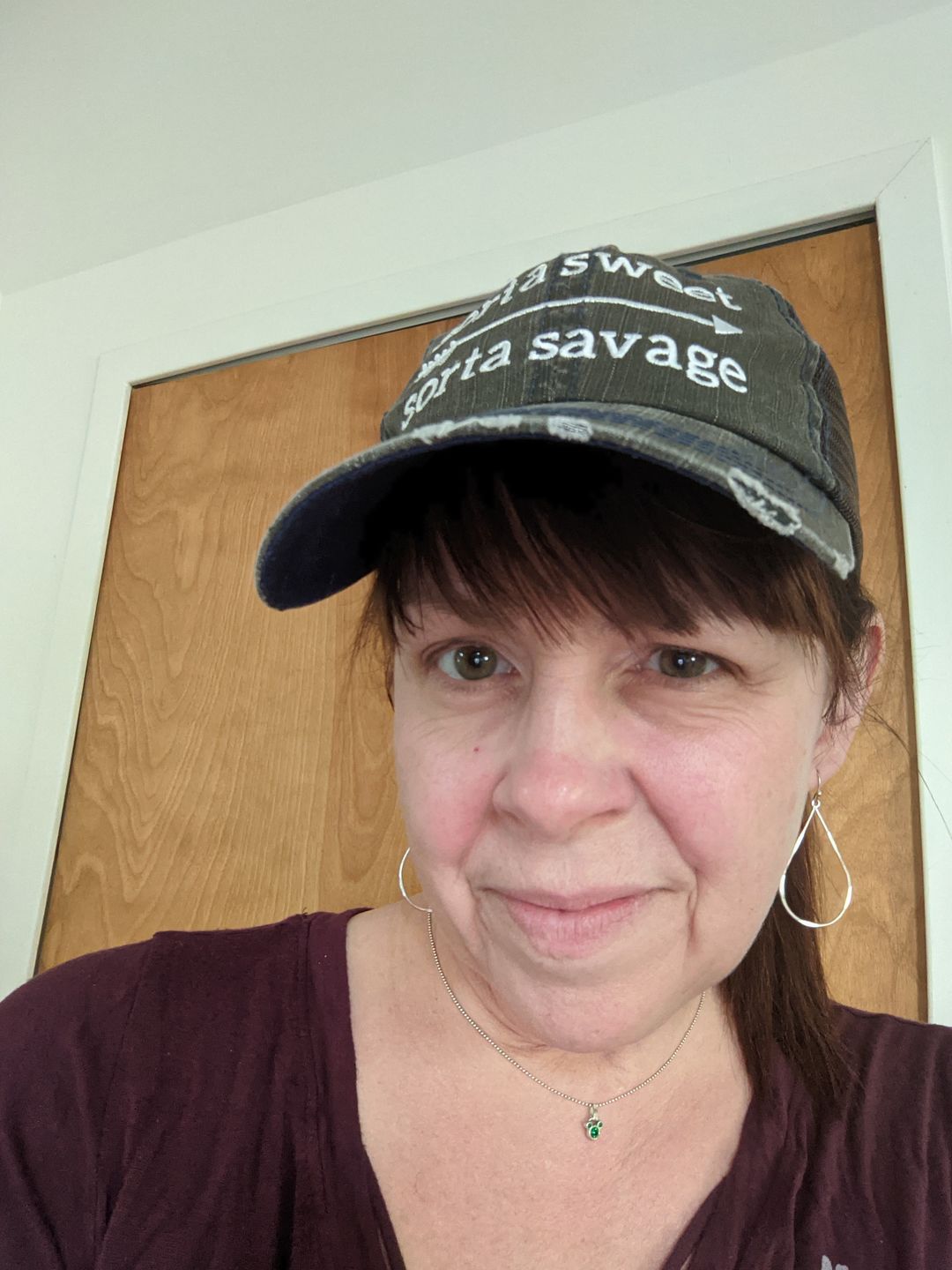Customer photo review of Sorta Sweet Sorta Savage Trucker Hat