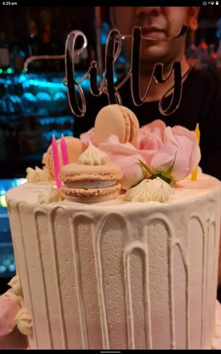 Customer photo review of Mirror Personalised Cake Topper (other colours available)