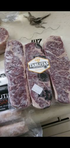 Reseña con foto de un cliente sobre Kit Carne Asada