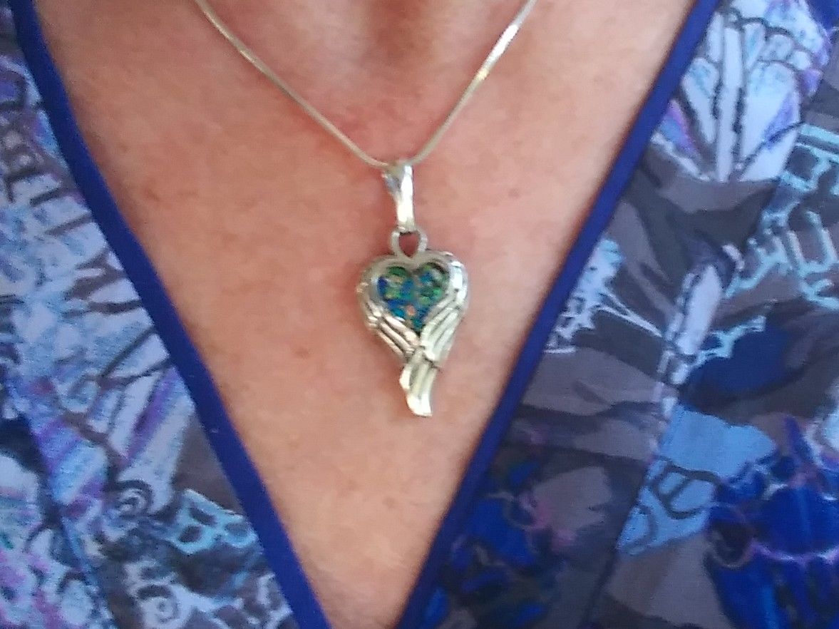 Customer photo review of Petite Angel Wing Pendant - Engravable