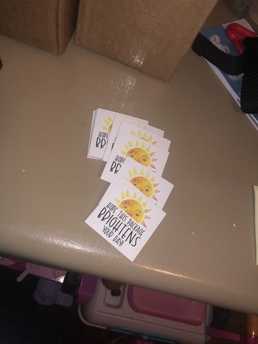 Customer photo review of Hope this package brightens your day sticker